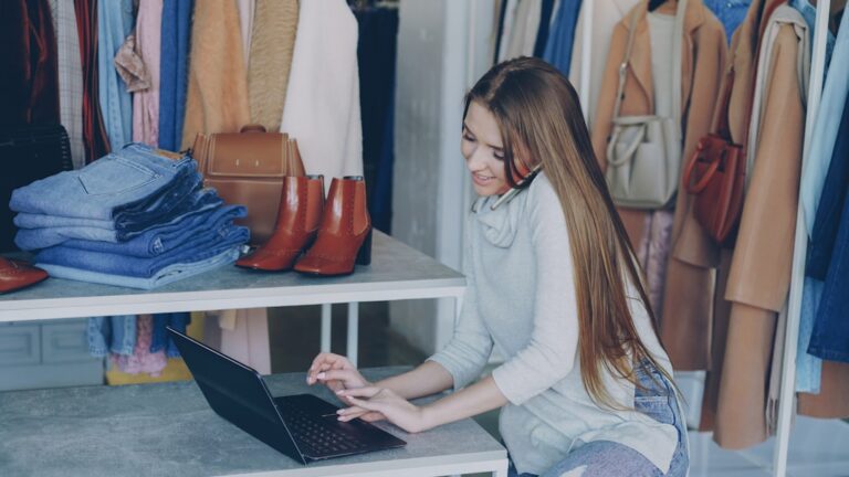 Local business owner using a laptop to review search performance and online visibility